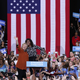 Hillary Clinton and Michelle Obama greet supporters during a campaign event at the Lawrence Joel Veterans Memorial Coliseum in Winston-Salem, North Carolina.